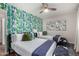 Bedroom with two twin beds, fun wallpaper and bright decor at 8638 E Whitton Ave, Scottsdale, AZ 85251