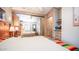 Bright bedroom with mirrored closet and two lamps at 880 Motherlode Dr # 1099, Apache Junction, AZ 85119
