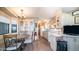 Bright kitchen features ample cabinetry and a dining area at 880 Motherlode Dr # 1099, Apache Junction, AZ 85119