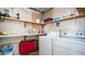 Laundry room with washer, dryer, and storage shelves at 880 Motherlode Dr # 1099, Apache Junction, AZ 85119