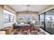 Bright living room featuring a futon and comfortable armchair at 880 Motherlode Dr # 1099, Apache Junction, AZ 85119
