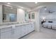 Elegant bathroom with double vanity, marble counters, and a large walk-in shower at 9254 N 82Nd St, Scottsdale, AZ 85258