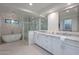 Spa-like bathroom with soaking tub, walk-in shower, and dual vanities at 9254 N 82Nd St, Scottsdale, AZ 85258