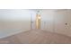 Simple bedroom with neutral wall and carpeting, double door closet at 9254 N 82Nd St, Scottsdale, AZ 85258