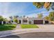 Stunning single-story home with a beautifully landscaped front yard and attached garage at 9254 N 82Nd St, Scottsdale, AZ 85258