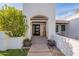 Modern front entrance with arched entryway at 9254 N 82Nd St, Scottsdale, AZ 85258