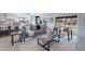 Bright and airy living room with large windows overlooking the pool at 9254 N 82Nd St, Scottsdale, AZ 85258