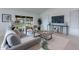 Cozy living room with a large TV and access to the backyard at 9254 N 82Nd St, Scottsdale, AZ 85258