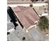 Aerial view of a single-Gathering home with a tile roof, fenced yard and desert landscaping at 10826 W Woodland Ave, Avondale, AZ 85323