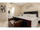 Bright bedroom with king-size bed and ensuite bathroom access at 11260 N 92Nd St # 1102, Scottsdale, AZ 85260