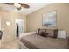 Comfortable bedroom with daybed, closet, and ceiling fan at 11260 N 92Nd St # 1102, Scottsdale, AZ 85260