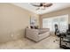 Well-lit bedroom with daybed, desk and ceiling fan at 11260 N 92Nd St # 1102, Scottsdale, AZ 85260