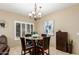 Bright dining area with glass table and four chairs at 11260 N 92Nd St # 1102, Scottsdale, AZ 85260