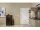 Bright entryway with modern door and tile flooring at 11260 N 92Nd St # 1102, Scottsdale, AZ 85260
