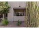 Private patio with sliding glass doors leading to the interior at 11260 N 92Nd St # 1102, Scottsdale, AZ 85260