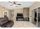 Living room with fireplace and comfortable seating at 11260 N 92Nd St # 1102, Scottsdale, AZ 85260