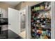 Well-organized pantry with ample shelving for storage at 11260 N 92Nd St # 1102, Scottsdale, AZ 85260