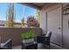 Private patio with seating and potted plants at 11260 N 92Nd St # 1102, Scottsdale, AZ 85260