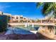 Refreshing pool area with fountain and seating at 11260 N 92Nd St # 1102, Scottsdale, AZ 85260