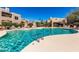 Community pool with lounge chairs and clear water at 11260 N 92Nd St # 1102, Scottsdale, AZ 85260