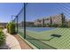 Community tennis court with chain-link fence at 11260 N 92Nd St # 1102, Scottsdale, AZ 85260