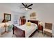 Cozy bedroom with a wooden sleigh bed and window seating at 11596 W Sierra Dawn -- # 132, Surprise, AZ 85378
