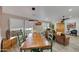 Bright dining area with a rustic wooden table and leather armchairs at 11596 W Sierra Dawn -- # 132, Surprise, AZ 85378