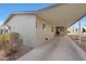 Tan exterior with carport and landscaping at 11596 W Sierra Dawn -- # 132, Surprise, AZ 85378