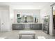 Elegant bathroom with and vanities and a large mirror at 13613 N 76Th St, Scottsdale, AZ 85260