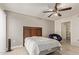 Cozy bedroom with ceiling fan and ample closet space at 1645 W Baseline Rd # 2041, Mesa, AZ 85202