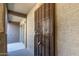 Condo entry with security door and adjacent patio at 1645 W Baseline Rd # 2041, Mesa, AZ 85202