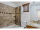 Bathroom with tile shower/tub combo and granite vanity at 16649 W Polk St, Goodyear, AZ 85338