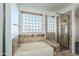 Bathroom features a bathtub, shower, and tile at 16649 W Polk St, Goodyear, AZ 85338