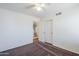 Bedroom with ceiling fan and double door closet at 16649 W Polk St, Goodyear, AZ 85338