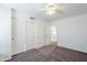 Bedroom with double door closet and carpet flooring at 16649 W Polk St, Goodyear, AZ 85338