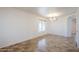 Bright dining room with tiled floors and a chandelier at 16649 W Polk St, Goodyear, AZ 85338