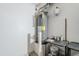 Unfinished garage with water heater and storage at 16649 W Polk St, Goodyear, AZ 85338