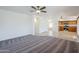 Living room with tile floors and open concept design at 16649 W Polk St, Goodyear, AZ 85338