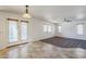 Open living area with access to backyard patio at 16649 W Polk St, Goodyear, AZ 85338
