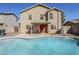Inviting kidney-shaped pool with large backyard at 16649 W Polk St, Goodyear, AZ 85338