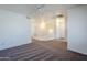 Upstairs hallway with carpet and access to bedrooms at 16649 W Polk St, Goodyear, AZ 85338