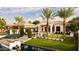 Waterfront home with pool, dock, and boat on canal at 1710 W Glacier Way, Chandler, AZ 85248