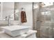 Clean bathroom with white sink, marble countertop, and glass shower at 1710 W Glacier Way, Chandler, AZ 85248