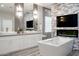 Elegant bathroom with double vanities, free-standing tub and fireplace at 1710 W Glacier Way, Chandler, AZ 85248