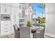 Bright breakfast nook with view of backyard and seating for four at 1710 W Glacier Way, Chandler, AZ 85248