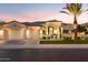 Beautiful home with a well-manicured lawn, and a modern design at 1710 W Glacier Way, Chandler, AZ 85248