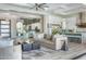 Open concept living area with glass-walled office and kitchen views at 1710 W Glacier Way, Chandler, AZ 85248