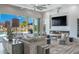 Living room boasts a fireplace and sliding doors opening to a pool view at 1710 W Glacier Way, Chandler, AZ 85248