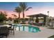 Gorgeous pool and patio with pergola, outdoor seating and canal view at 1710 W Glacier Way, Chandler, AZ 85248