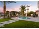 Stunning pool and patio with outdoor seating and canal view at 1710 W Glacier Way, Chandler, AZ 85248